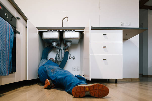 Professional Emergency Plumber technician working in Cokato, MN